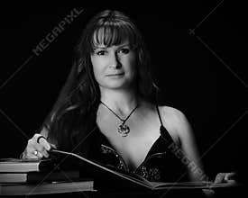 Portrait of a Beautiful Woman Reading Books