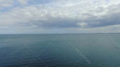 Aerial view on coast in Whitehead, Northern Ireland. Drone photo of town and water of Irish Sea