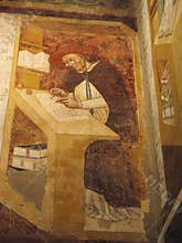 Fresco image of a Medieval monk with spectacles, earliest recorded image of eye glasses