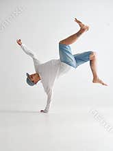 Cool guy breakdancer dancing lower break dance isolated on white background. Dance school poster. Break dance lessons