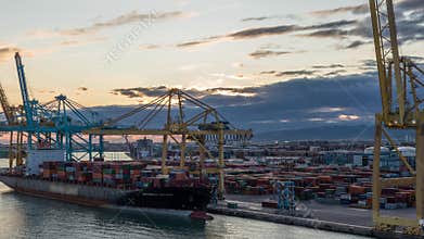 Aerial view of the sea cargo port and container terminal of Barcelona timelapse, Barcelona, Catalonia, Spain.