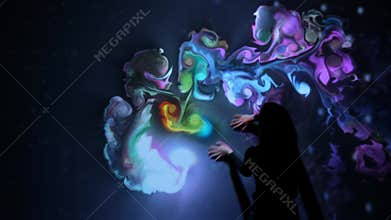 Girl plays with interactive video installation, New art form, generative graphics. Silhouette of girl draws multi