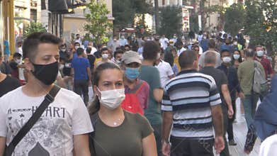Istanbul / Turkey - 08-05-2020  corona virus. covid 19. new normal life istanbul. crowded street. masked people. Street walking, s