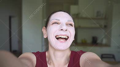 Slow motion video of woman with face mask. pov view. wellbeing self-care routine