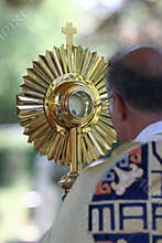 Priest Holding Monstrance