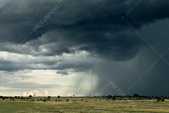 Rain cloud over Africa landscape