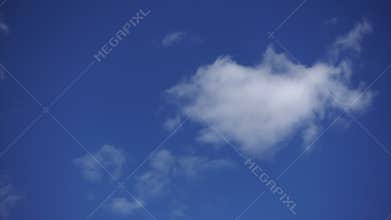 Fluffy clouds, Timelapse. White clouds at blue sky background. Clean air concept