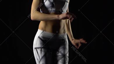 Close-up woman`s body jumping in kangoo jumps shoes. Slow motion