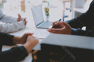Lawyer insurance broker consulting giving legal advice to couple customer about buying renting house. financial advisor with