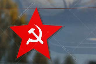 Red five-pointed star with sickle and hammer emblem