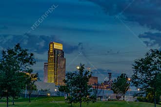 Night scene First National Bank Omaha building with baseball logo