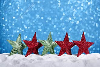 Glitter Stars in Snow Blue Background