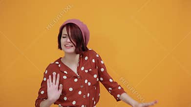 Young lady celebrating surprised, amazed for success with arms raised, open eyes