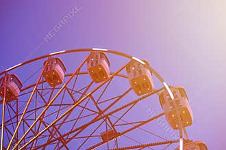 ferris wheel in amusement park at a night city