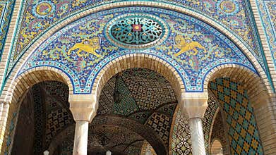 Colorful painting mosaic tiles on the wall at Golestan palace, Tehran, Iran