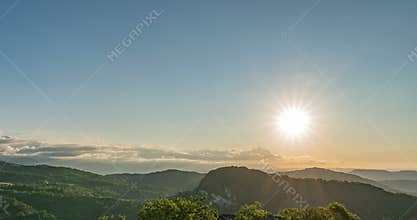Time lapse of clouds and sunrise in the mountains, Formation of cumulus clouds, beautiful summer landscape