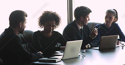 Diverse business people executives talk share ideas at conference break