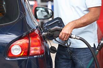 Detail Of Male Motorist Filling Car With Diesel
