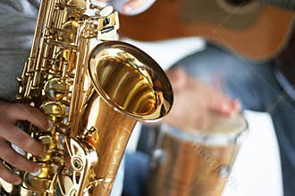 Saxophone, drums and guitar