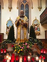 Statue of Saint Padre Pio with Eucharist