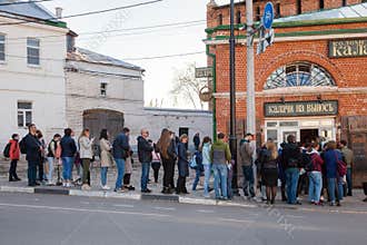 A tourists in queue at bakery store