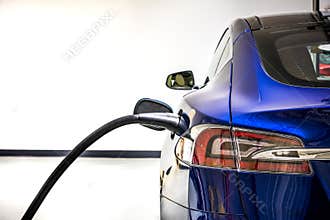 Electric Vehicle charging station system storing power on modern car. EV fuel for advanced hybrid car. automobile industry.