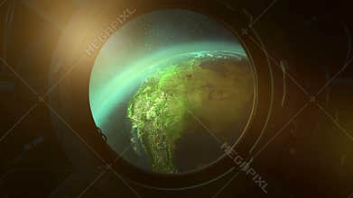 View of planet earth from the porthole from orbit.