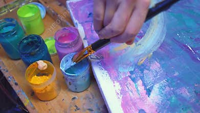 Art class hand acrylic paint brush abstract work