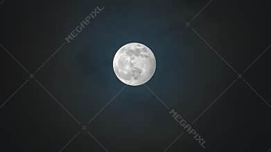Full moon against cloudy night sky