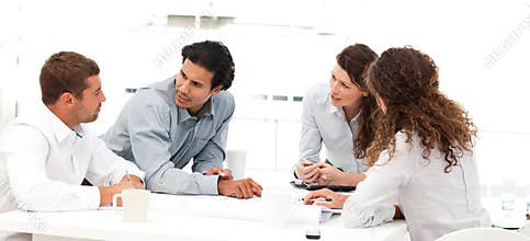 Four engineers discussing about a new project