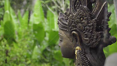 Indonesia god statue in Bali temple. Ancient sculpture religious idol