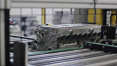 Engine Block Running on the Automated Conveyor Belt. Quality Control Camera.