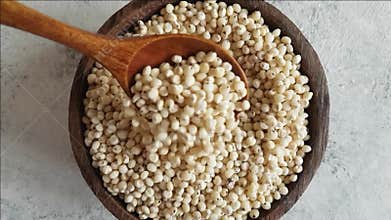 Raw White Sorghum grain in a bowl