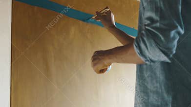 Professional creative artist painting an abstract artwork