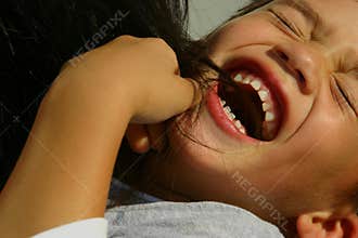 Laughing tickled boy