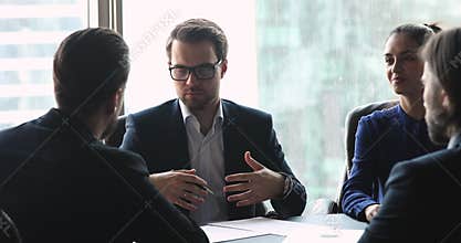 Group of smiling entrepreneurs establishing partnership, making agreement.