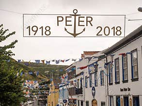 Sign celebrating centenary of Peter Cafe Sport in Horta, Faial, Azores Islands