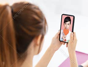 Young Woman Calling By Video Chat to  boyFriend