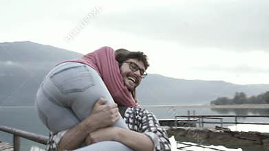 Romantic loving couple spending time at the lake