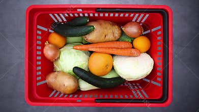 Shopping basket appear and filling with fresh fruits and vegetables - Stop motion