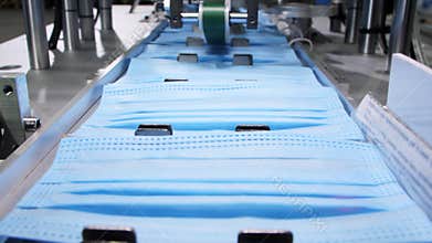 Manufacturing of disposable protective masks at factory