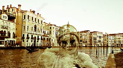 A mask on the Grand Canal in Venice