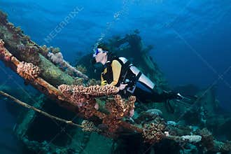 Diver over a shipwreck