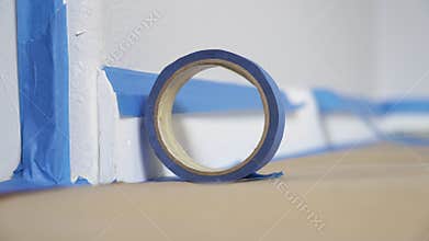 Masking blue tape on the floor. Preparation For Room Painting