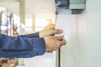 Hand Using Toilet Paper out toilet. diarrhea constipation.Health concept