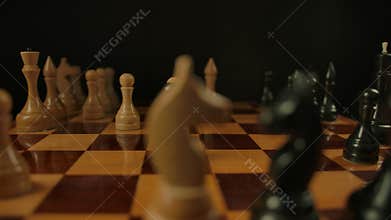 Time lapse of chess game from start to finish, two players moving chess pieces