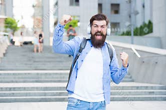 Energy concept. Joy and positivity. Route to work. Alone with music. Free and happy. Modern life. Man with headphones
