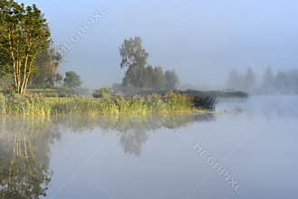 Misty foggy sunrise in summer