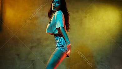 Beautiful Asian girl dancing freestyle, hip hop, dancehall, street dance style