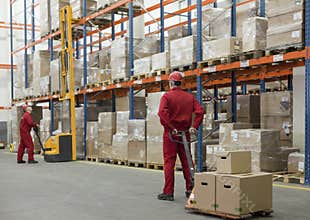 Logistic - workers in storehouse